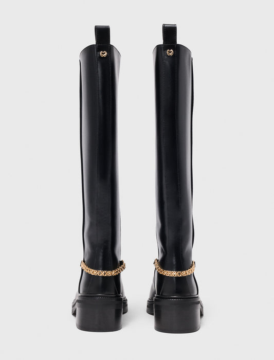 Botas planas de piel con cadena