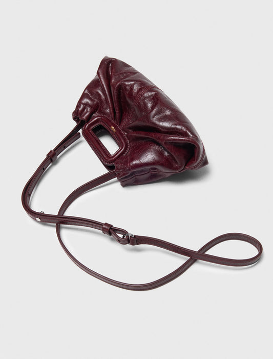 Mini clutch de piel craquelada