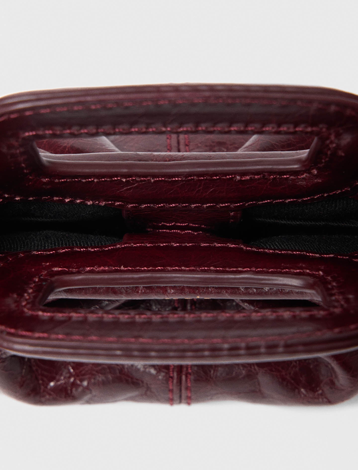 Mini clutch de piel craquelada