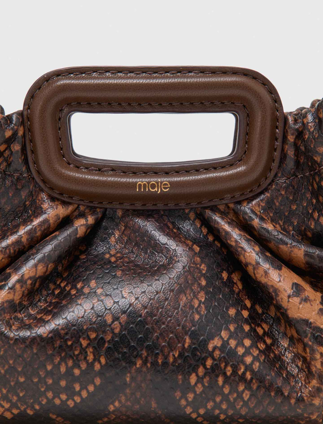 Milpli mini Clutch de piel grabada