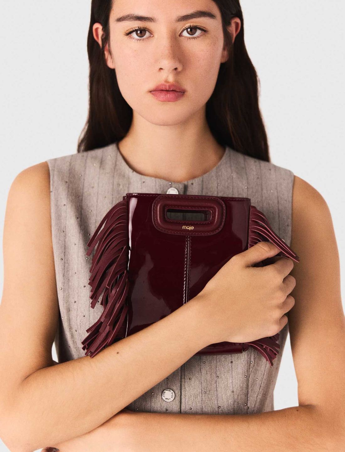 Bolso M mini de cuero liso y charol