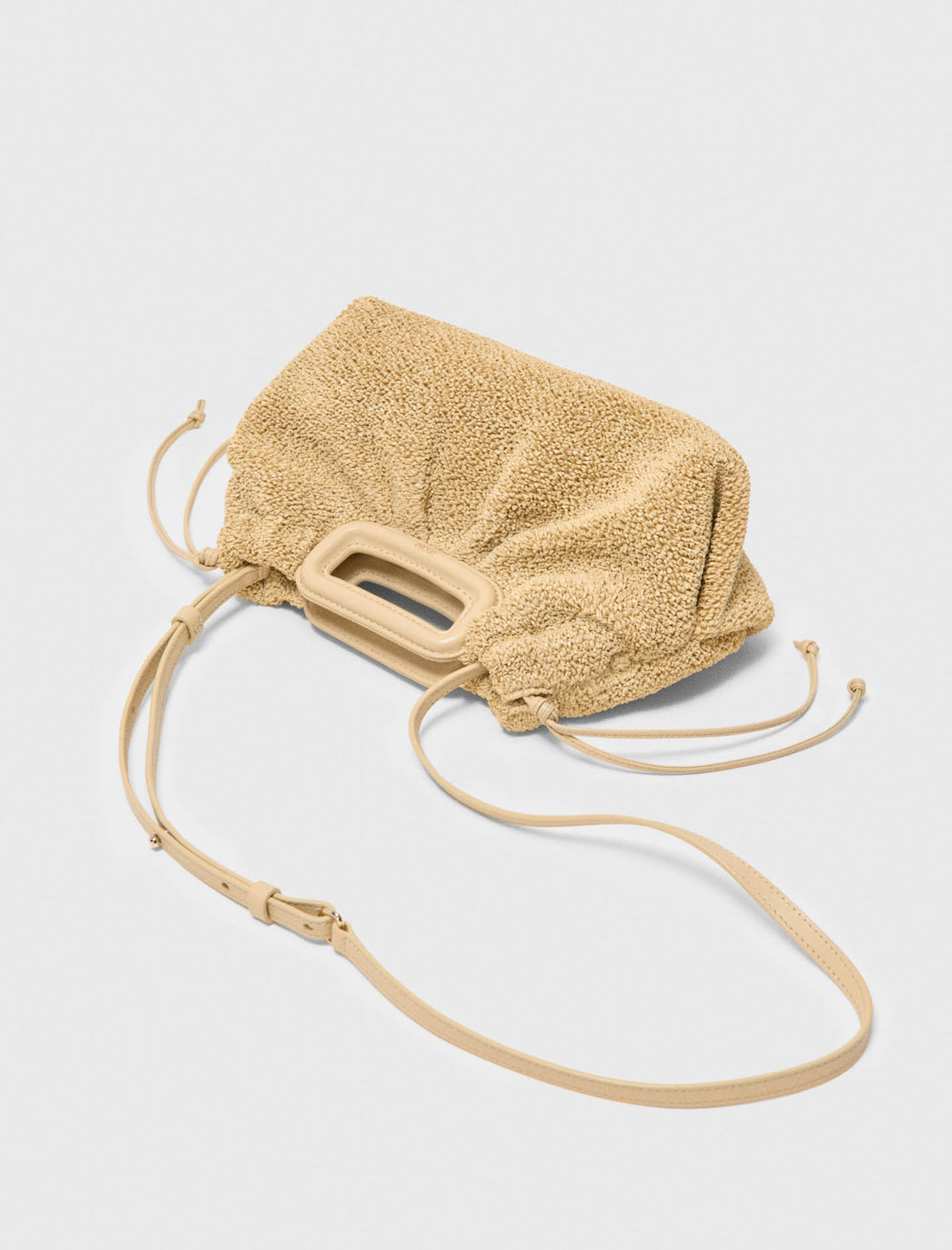 Bolso de mano Mipli con efecto rizado