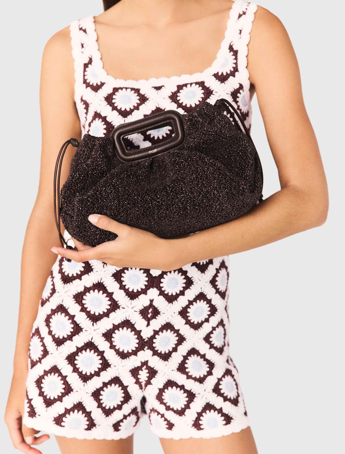 Bolso de mano Mipli con efecto rizado