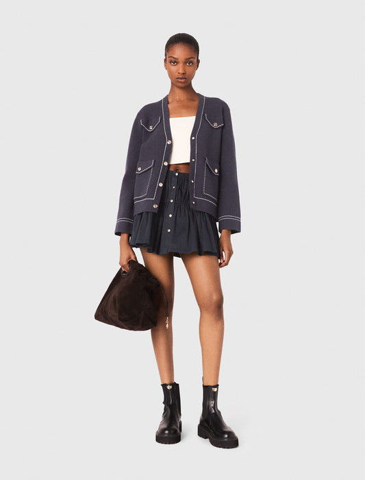 Cárdigan largo de punto pespunteado