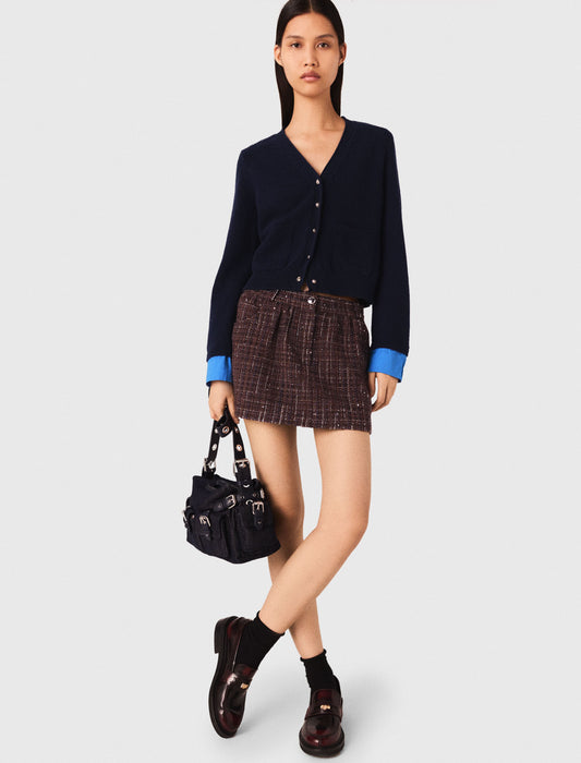 Cárdigan con detalles desmontables