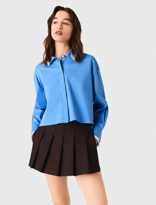 Camisa con joya desmontable