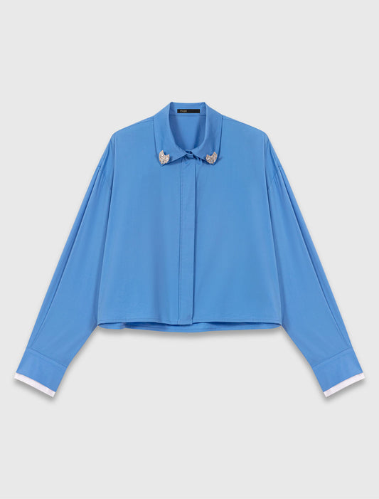 Camisa con joya desmontable