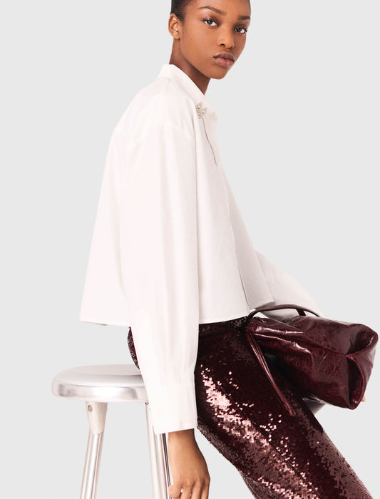 Camisa corta con detalles joya