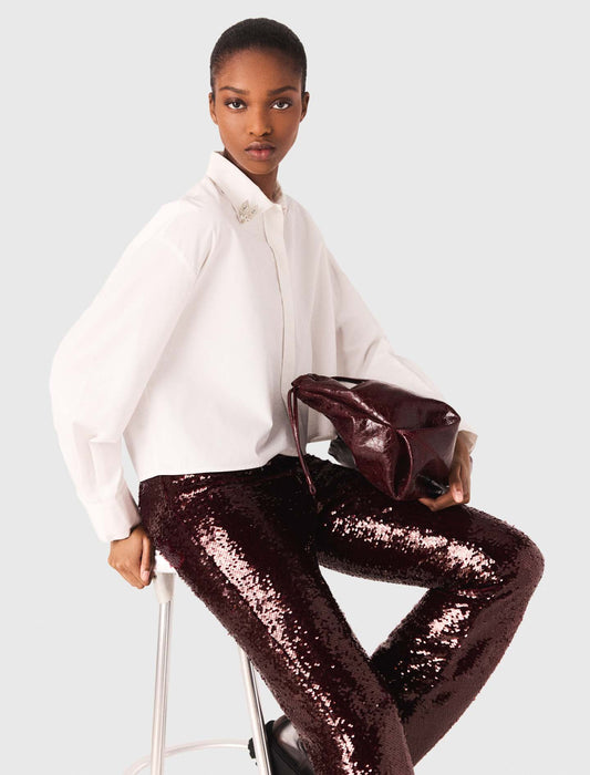 Camisa corta con detalles joya