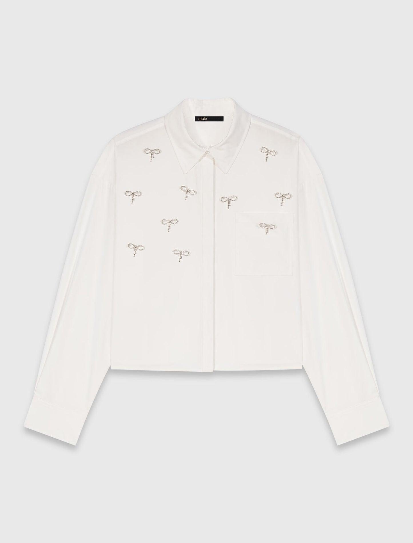Camisa con detalles joya