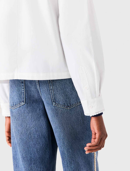 Camisa con lazo desmontable