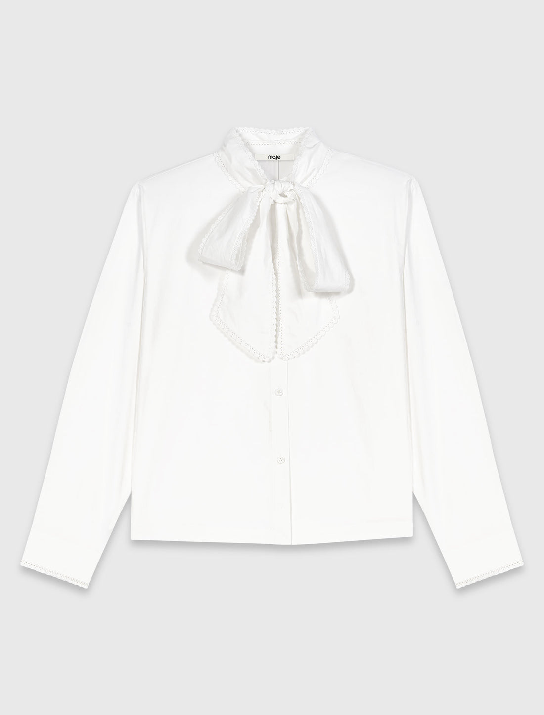 Camisa con lazo desmontable