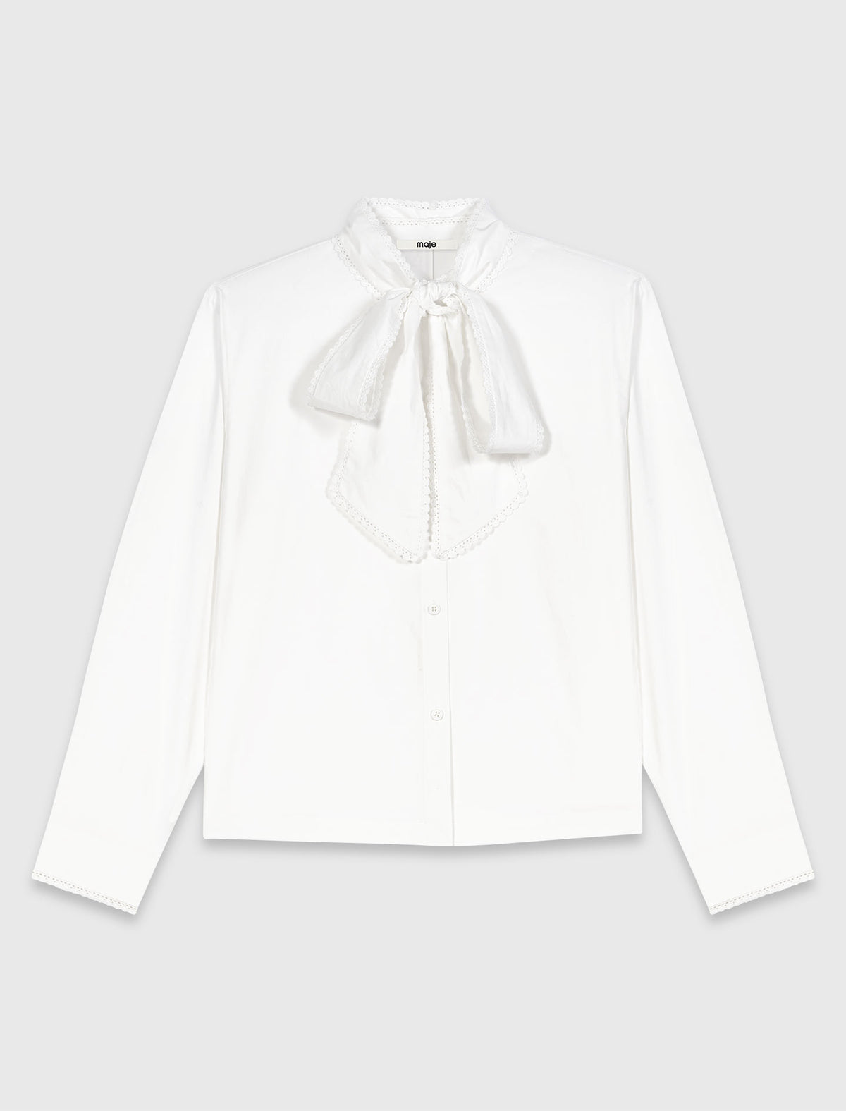 Camisa con lazo desmontable
