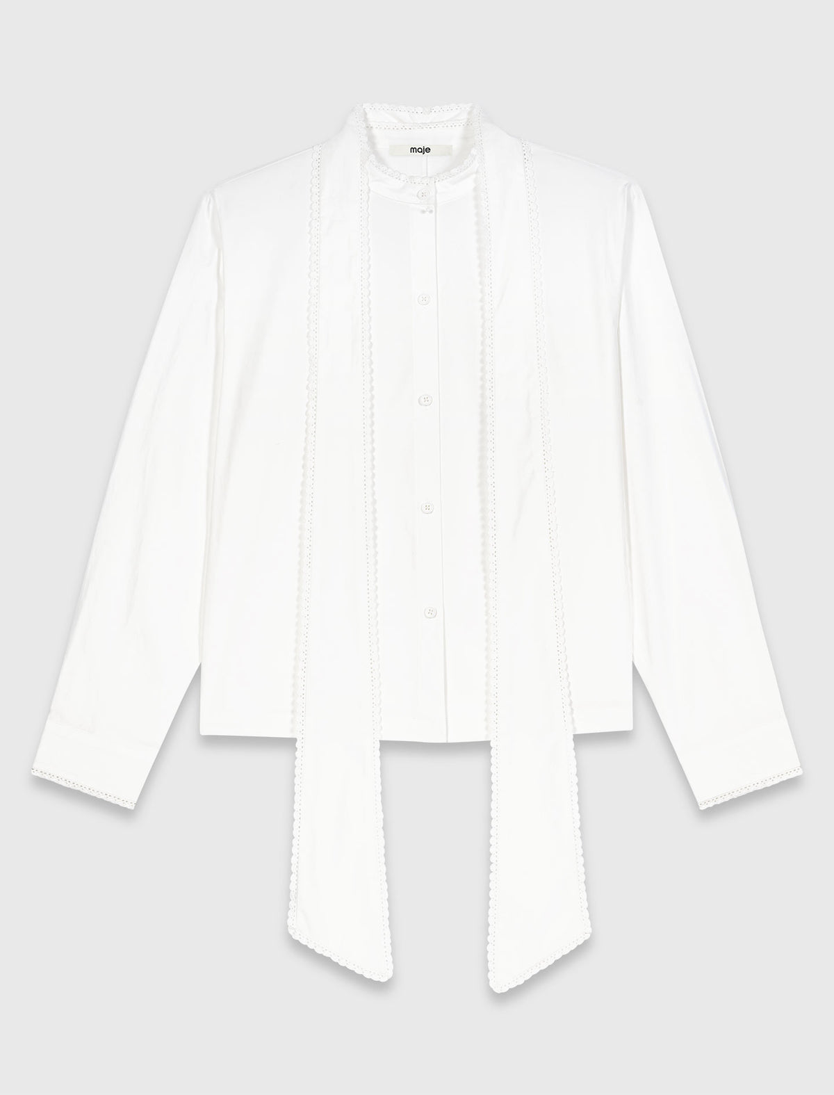 Camisa con lazo desmontable