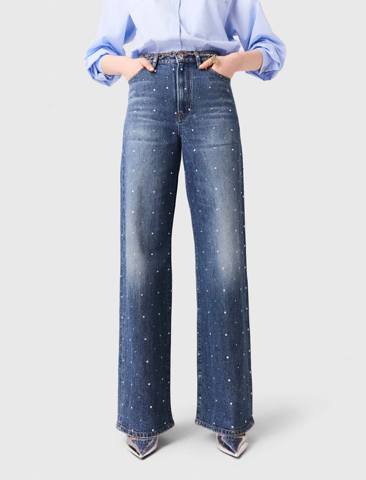 Vaquero ancho en denim con clavos