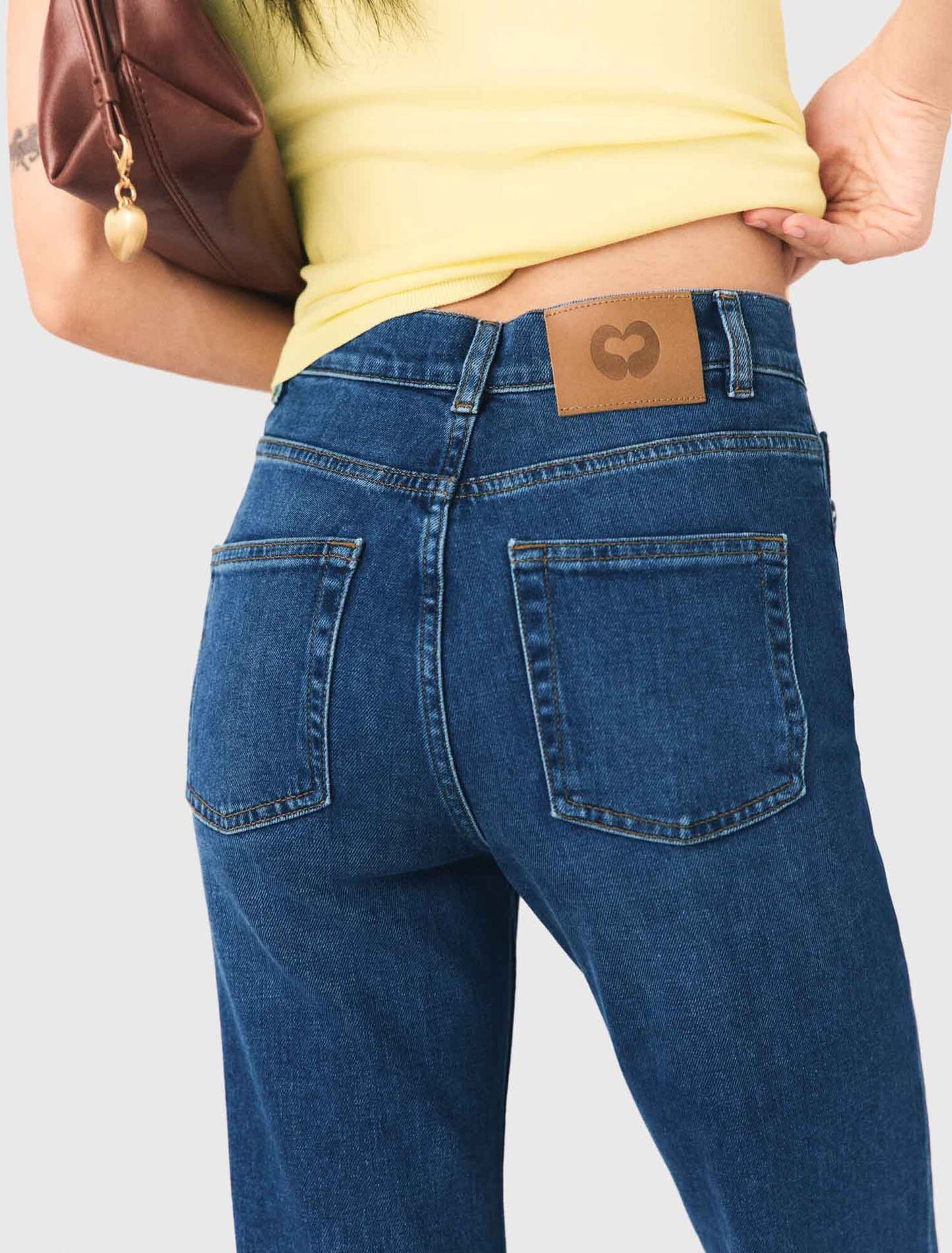 Vaquero bootcut con perlas