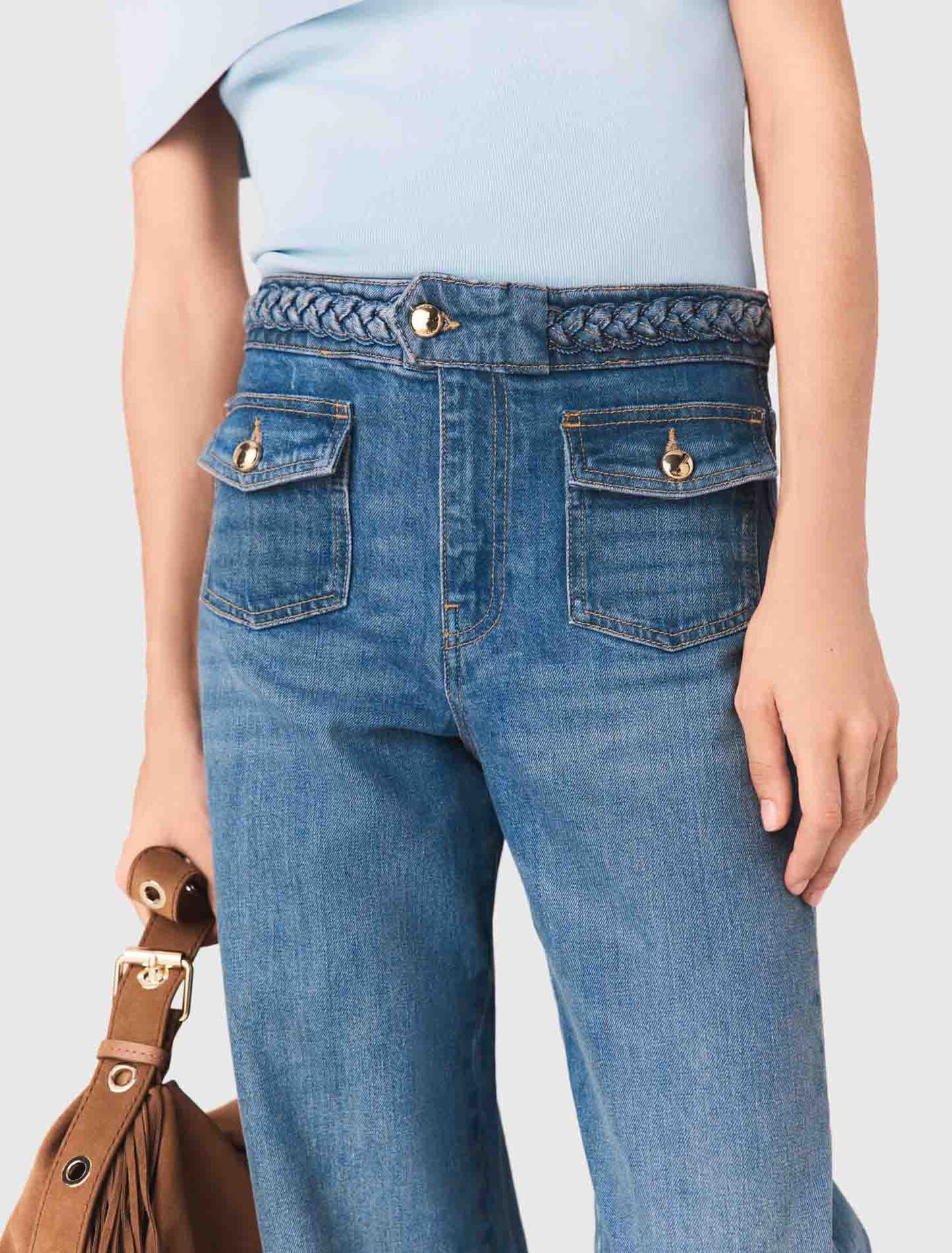 Vaquero acampanado con trenzas