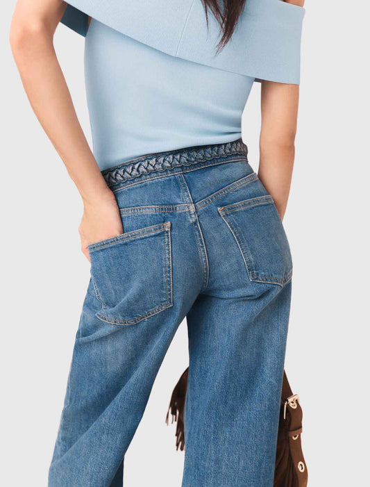 Vaquero acampanado con trenzas