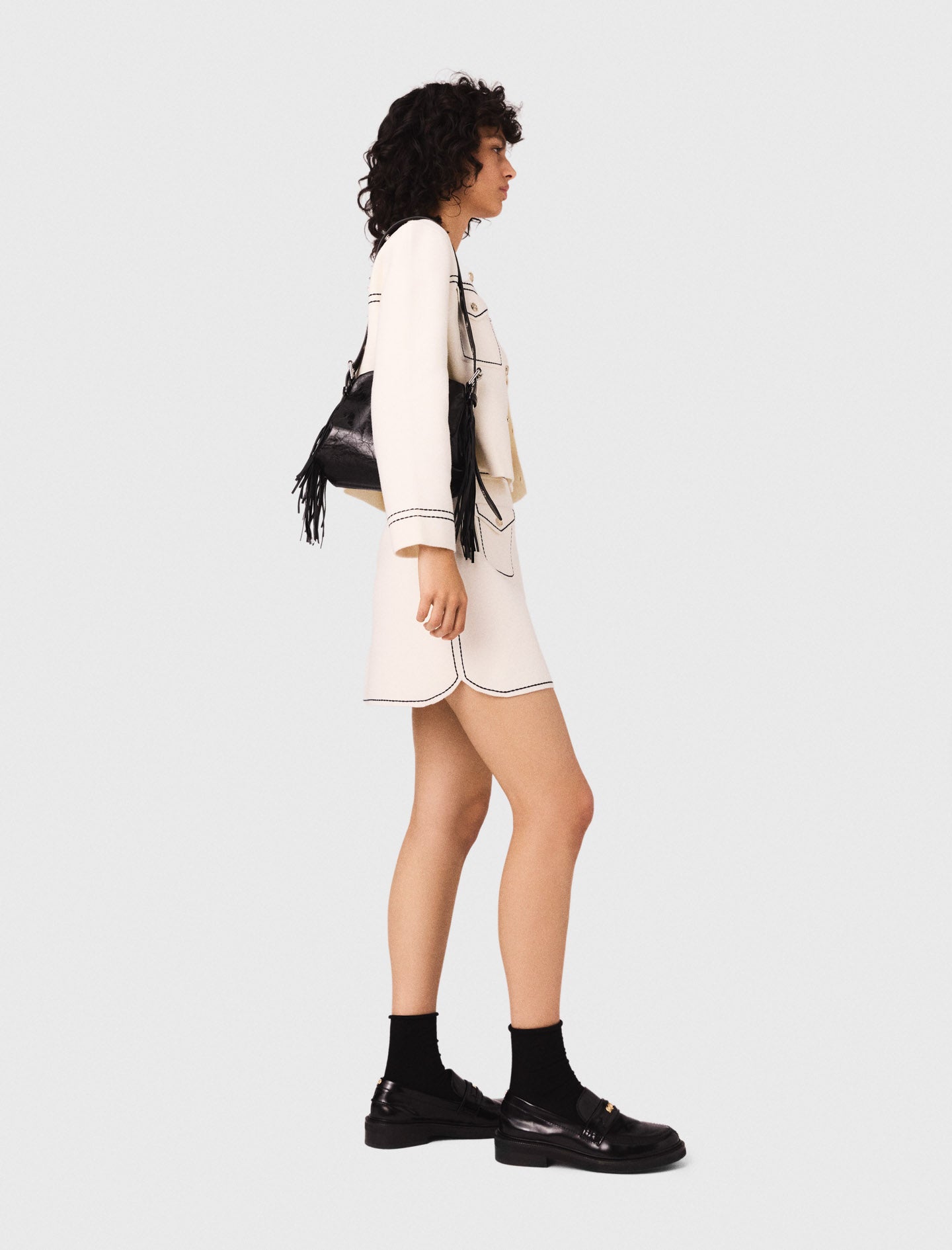 Falda corta de punto pespunteada