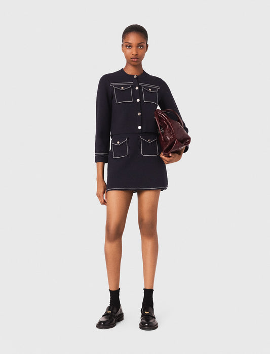 Falda corta de punto pespunteada