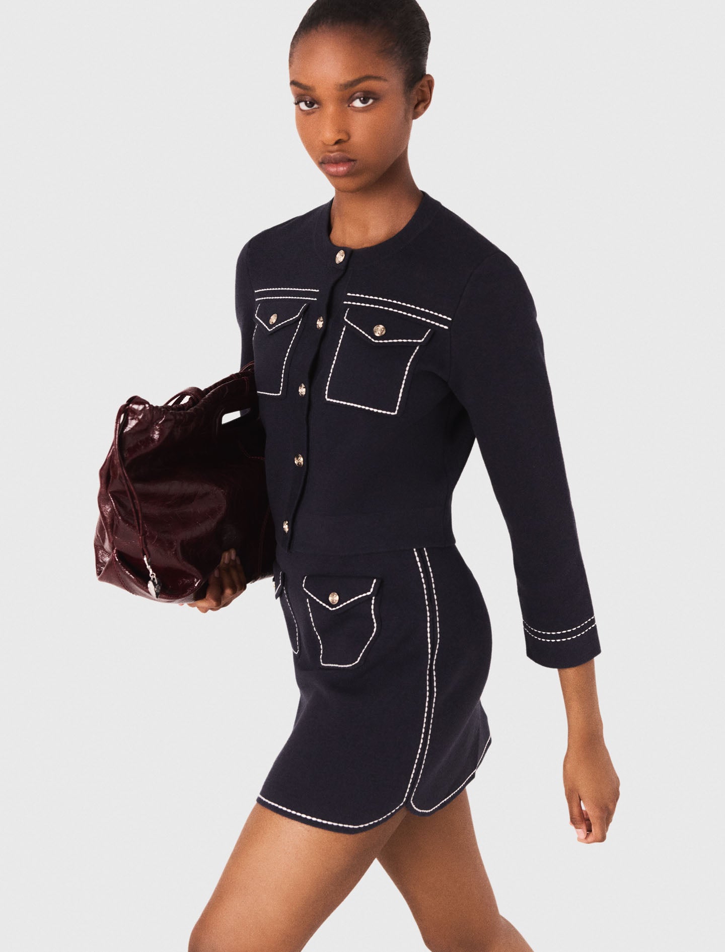 Falda corta de punto pespunteada