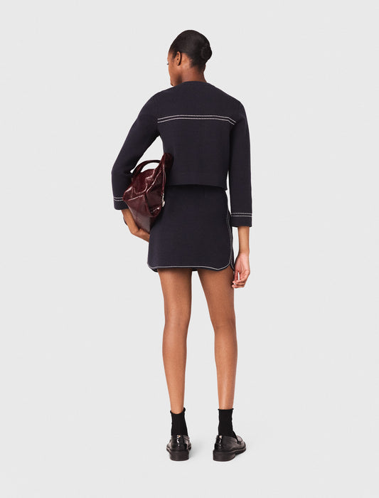 Falda corta de punto pespunteada