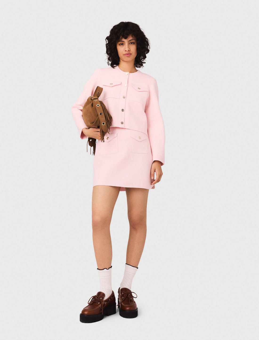 Falda corta de punto pespunteada