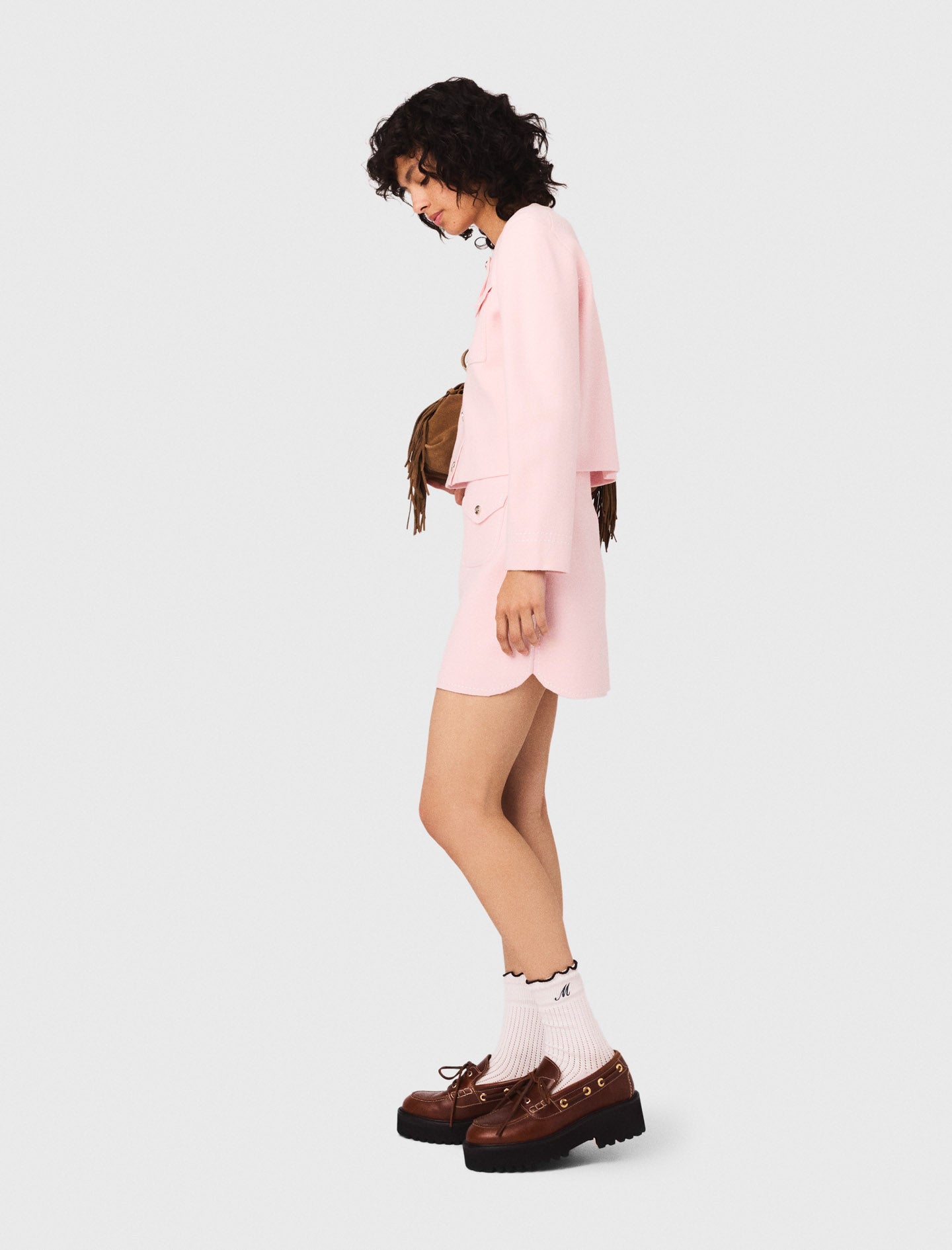 Falda corta de punto pespunteada