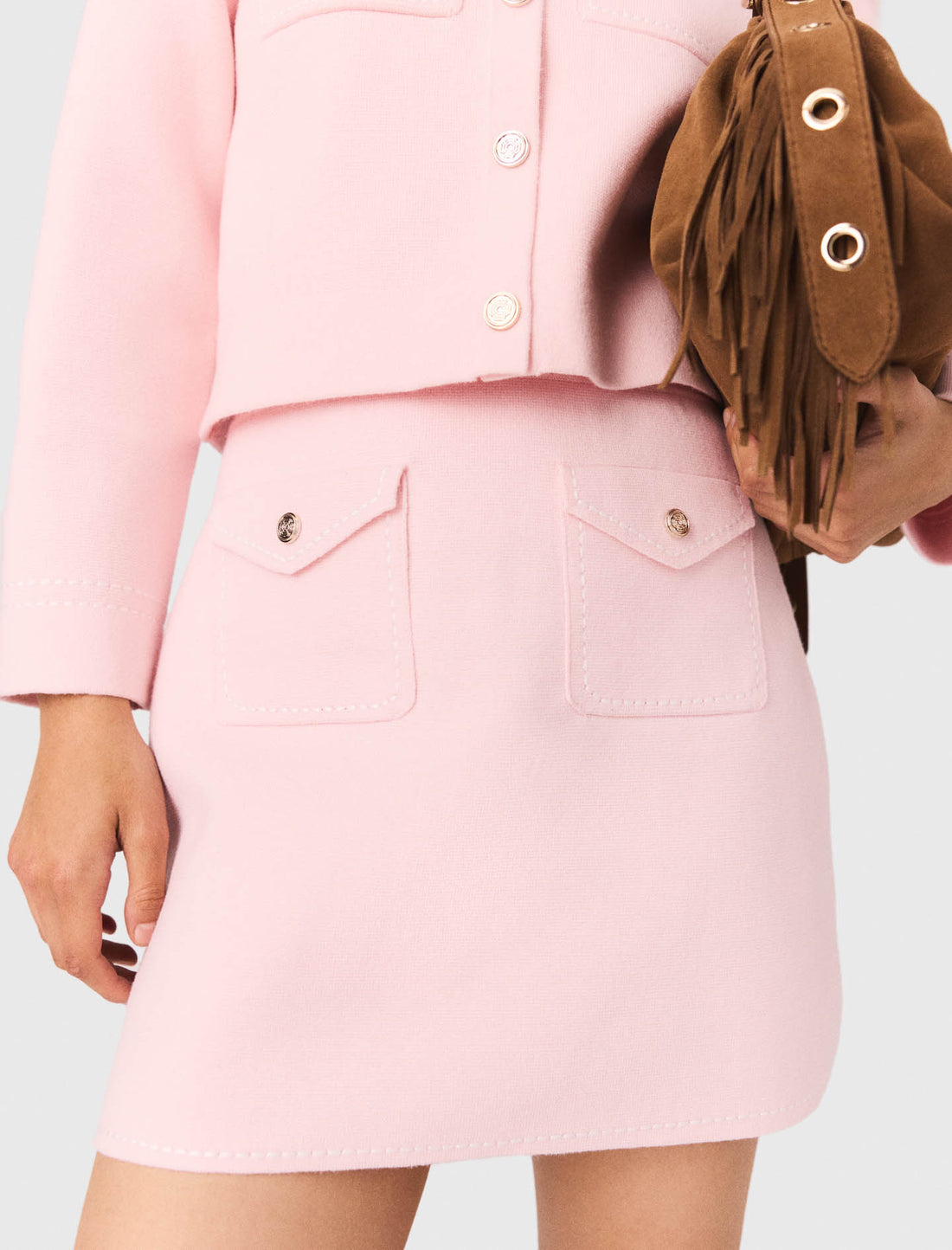 Falda corta de punto pespunteada