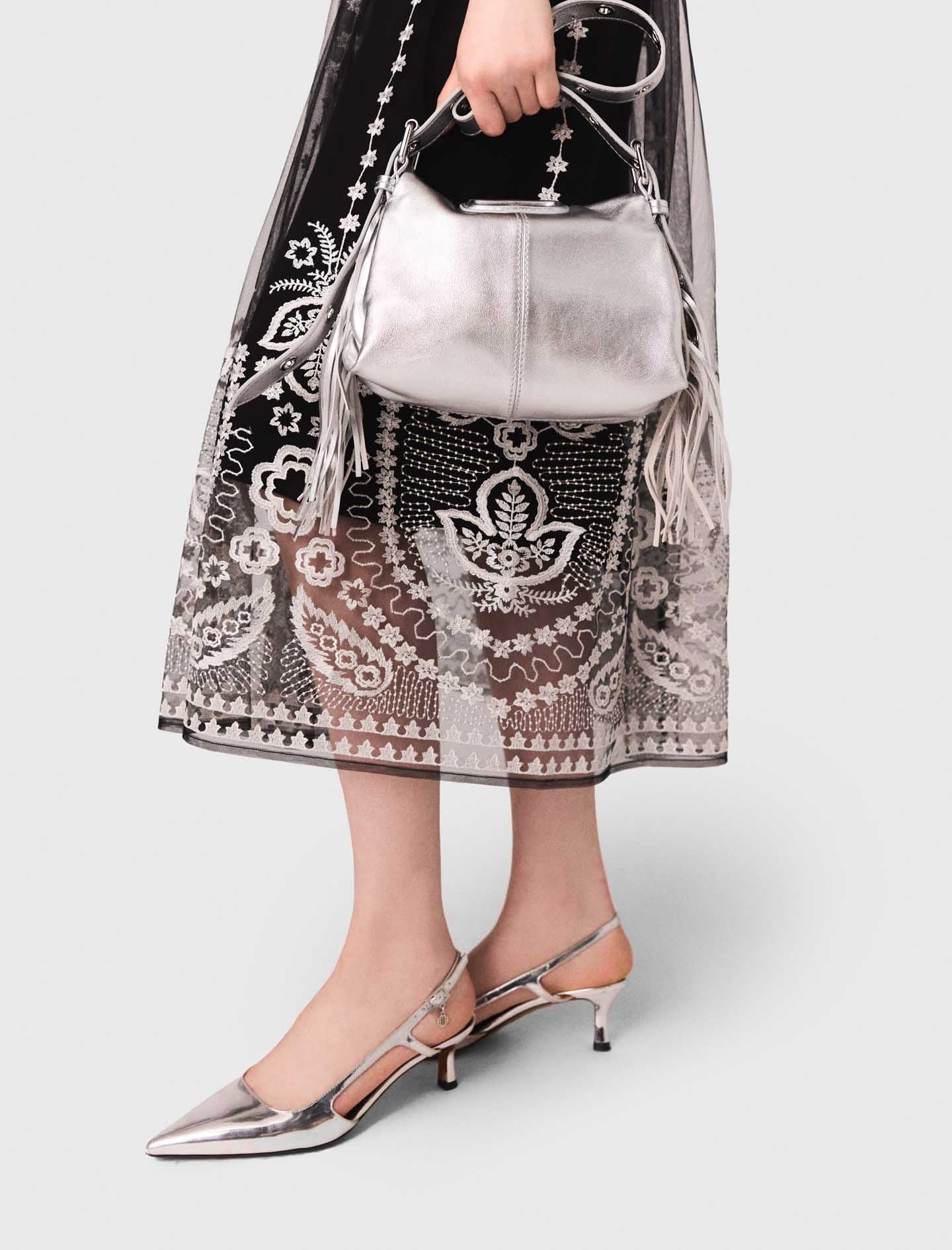 Falda larga de tul bordado