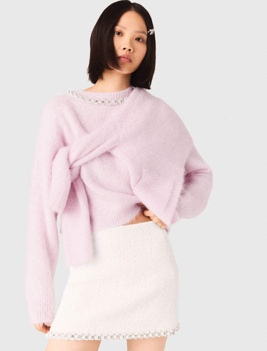 Falda de tweed con galón de perlas