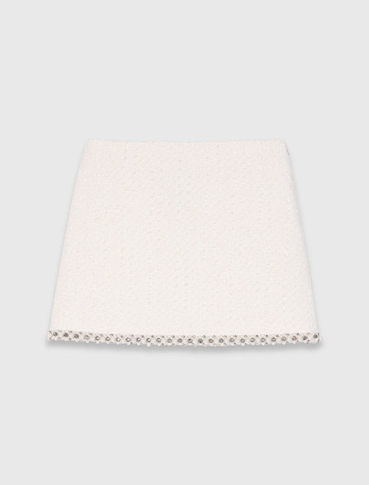 Falda de tweed con galón de perlas