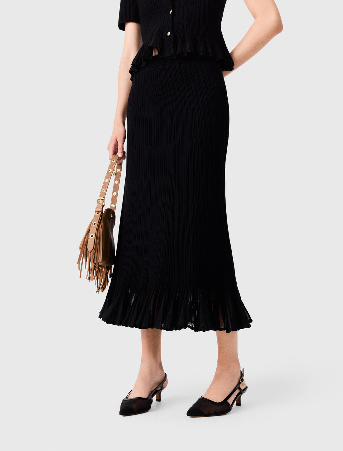 Falda de punto con bajo peplum