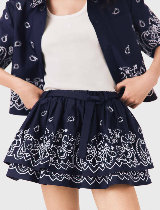 Falda corta bordada con volantes