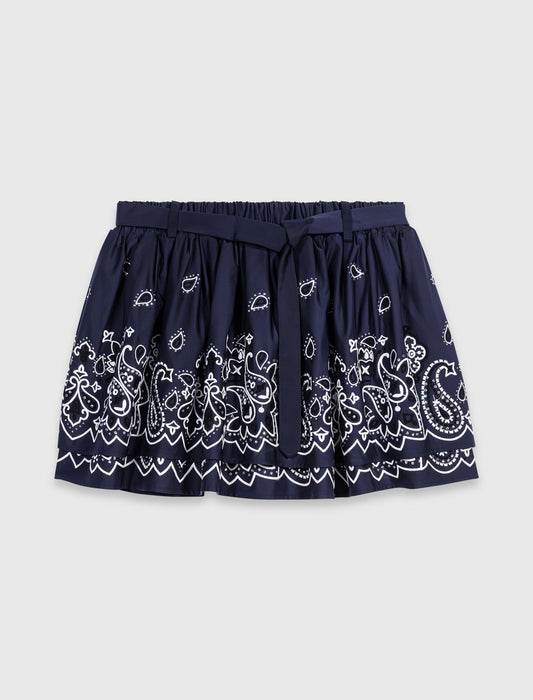 Falda corta bordada con volantes