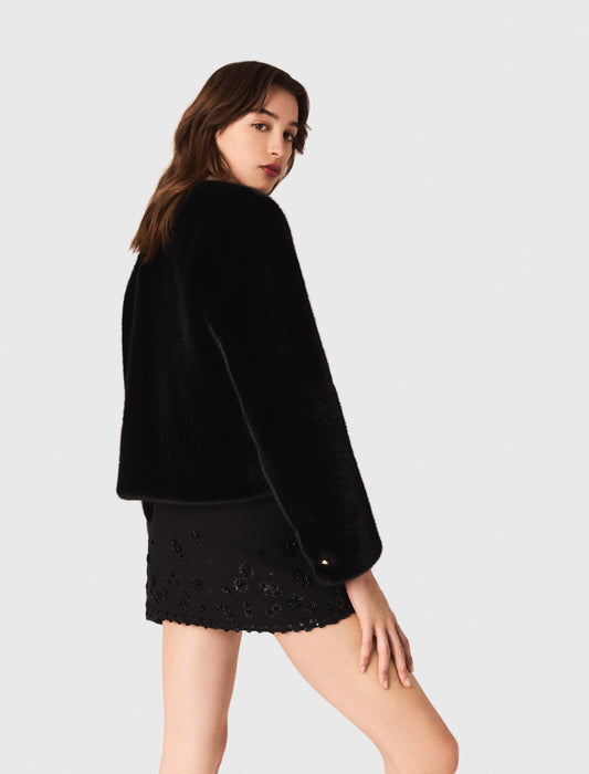 Abrigo corto de piel sintética