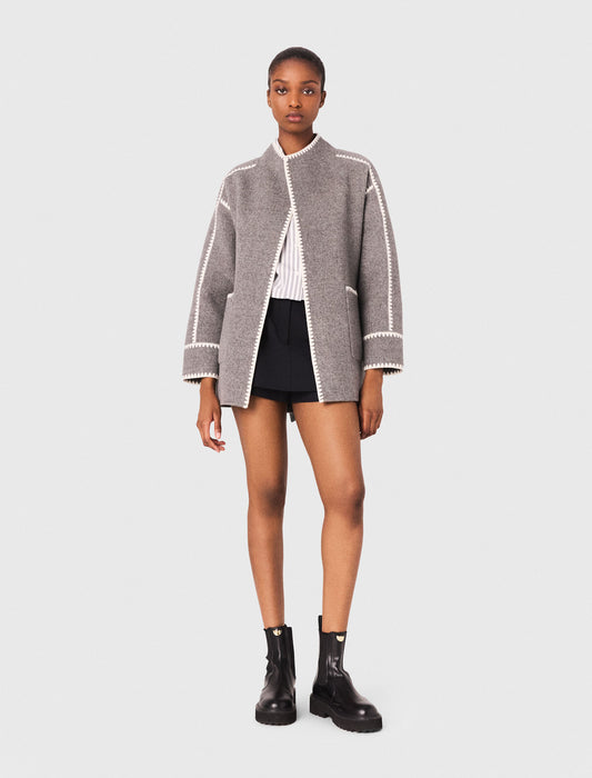 Abrigo corto reversible