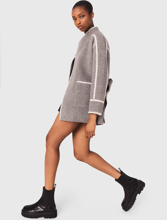 Abrigo corto reversible