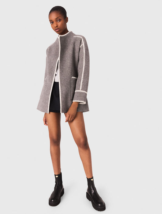 Abrigo corto reversible