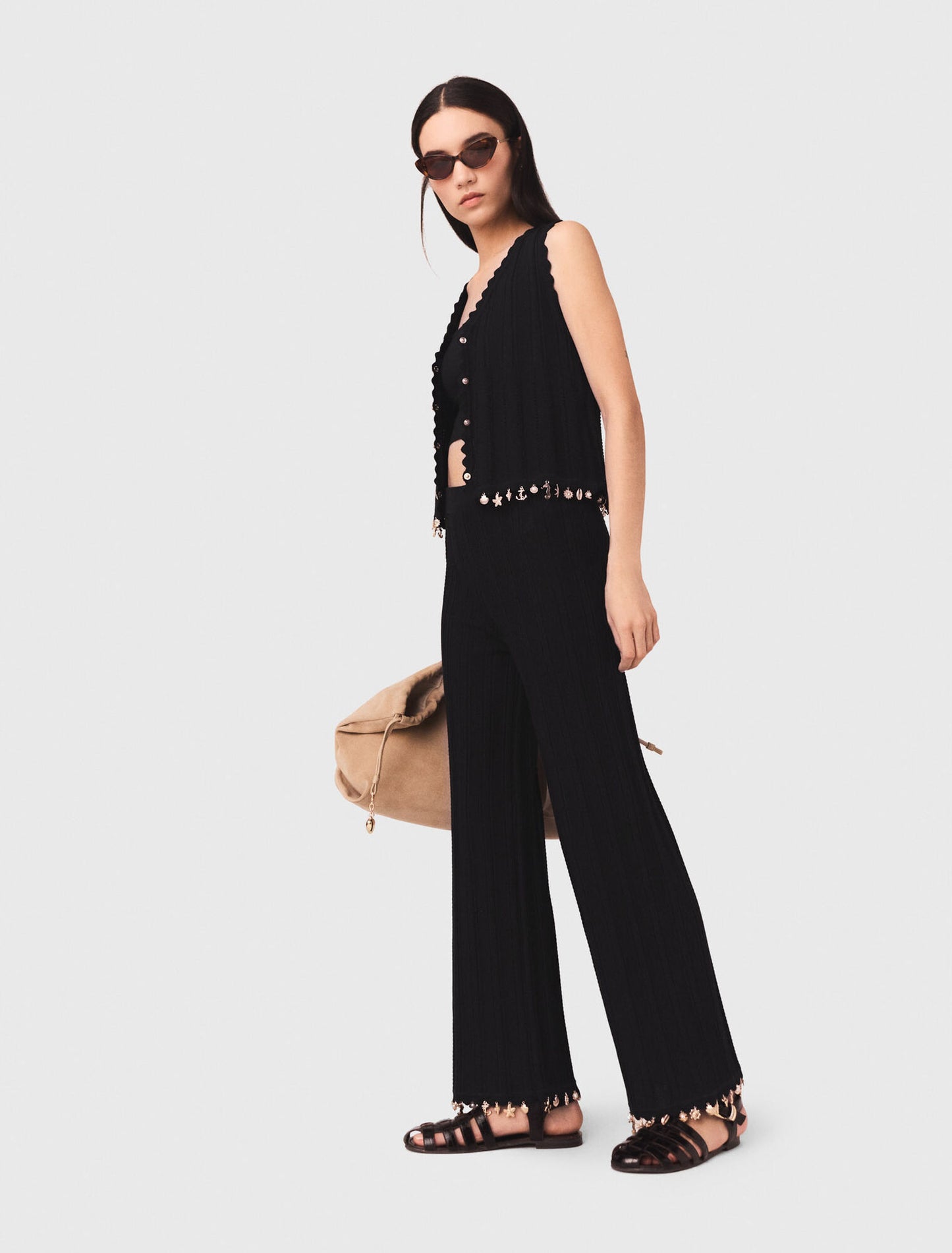 Pantalón de punto con joyas