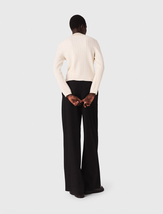 Polo de punto con cuello de strass