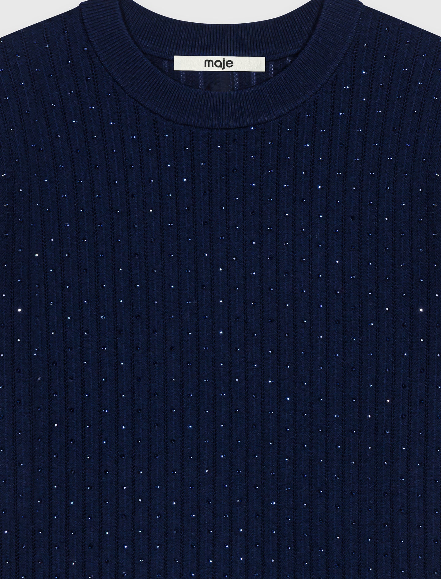Jersey con strass tono sobre tono