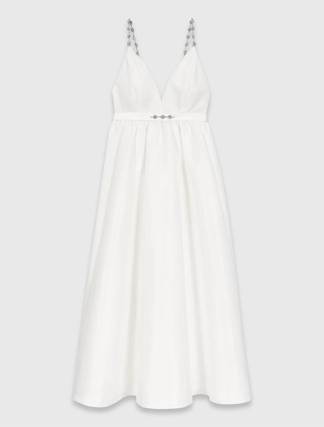 Vestido largo de tafetán con joyas