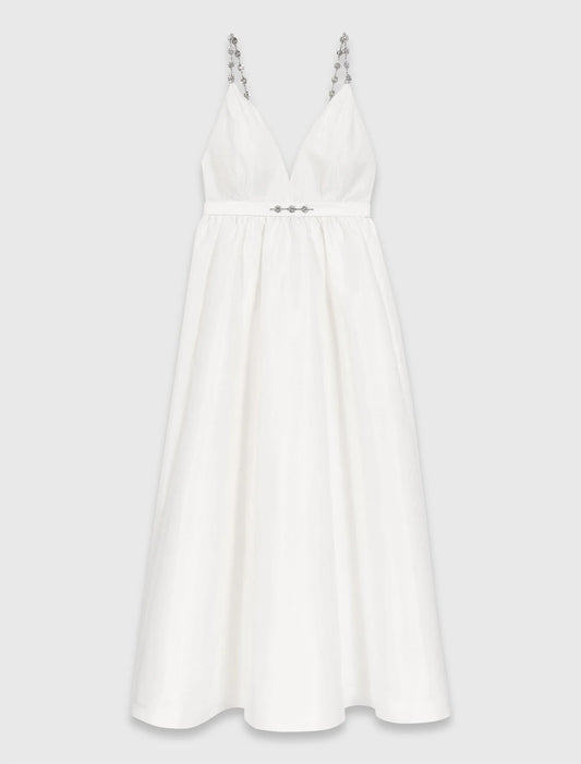 Vestido largo de tafetán con joyas