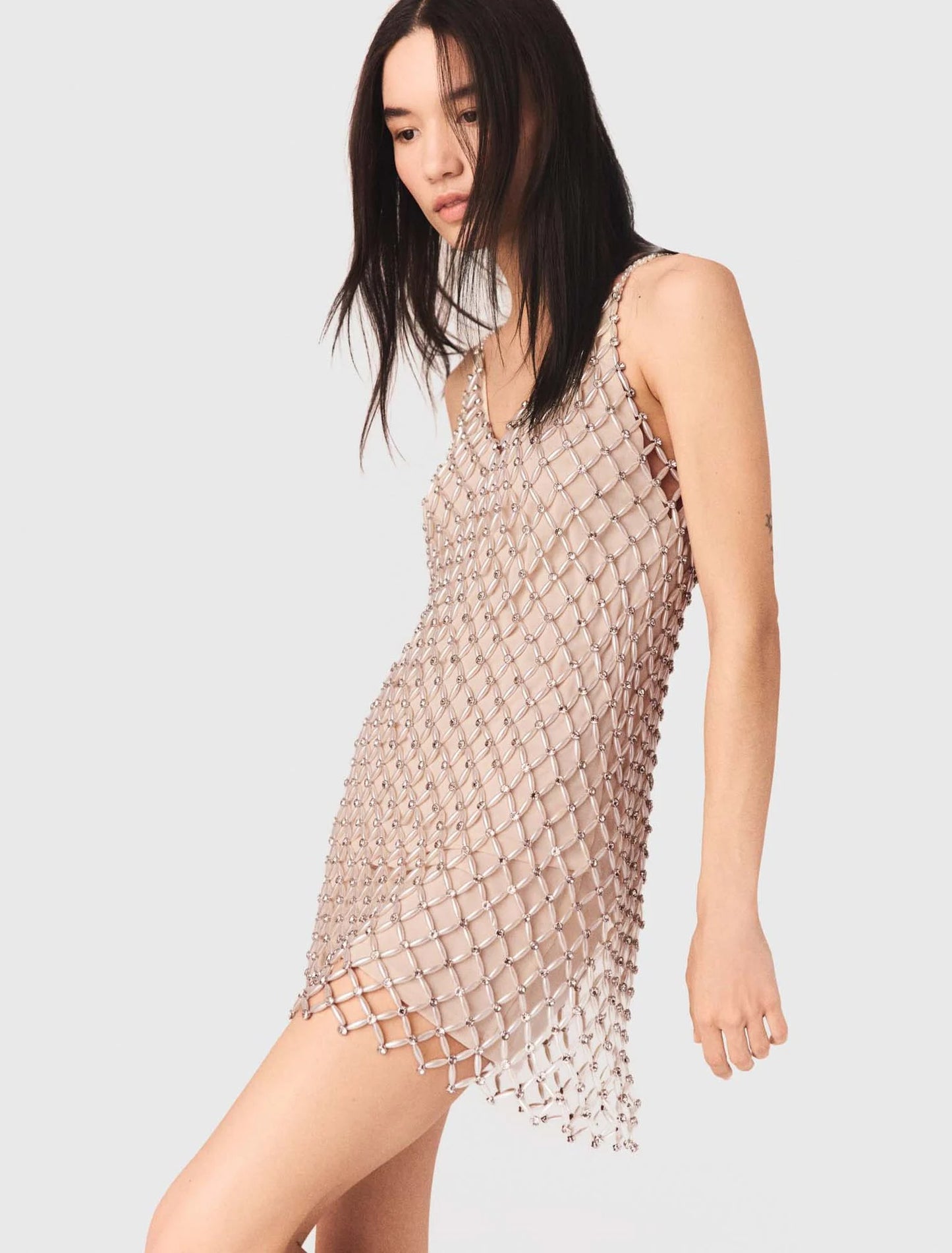 Vestido corto perlado con forro