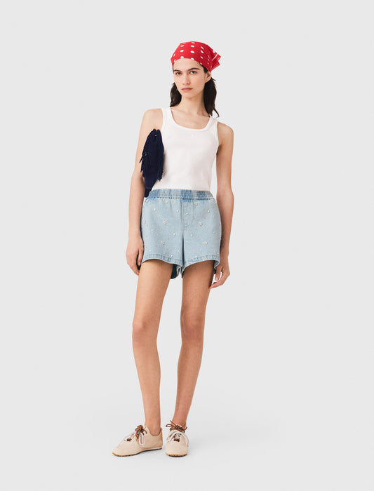 Short vaquero con flores