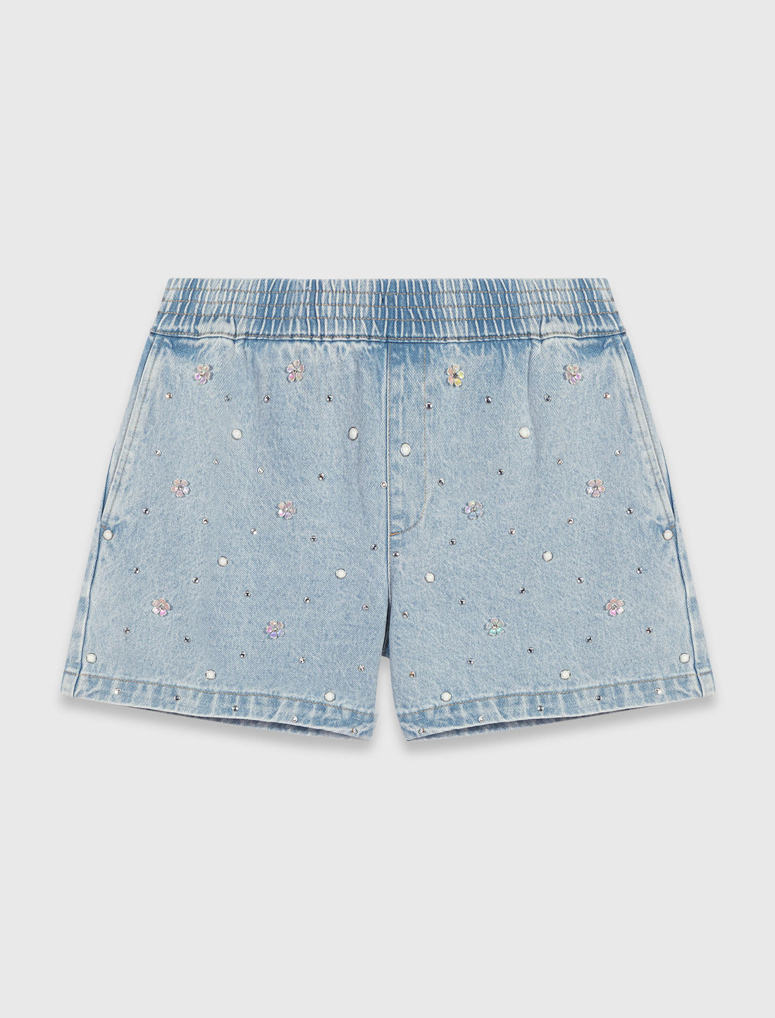 Short vaquero con flores