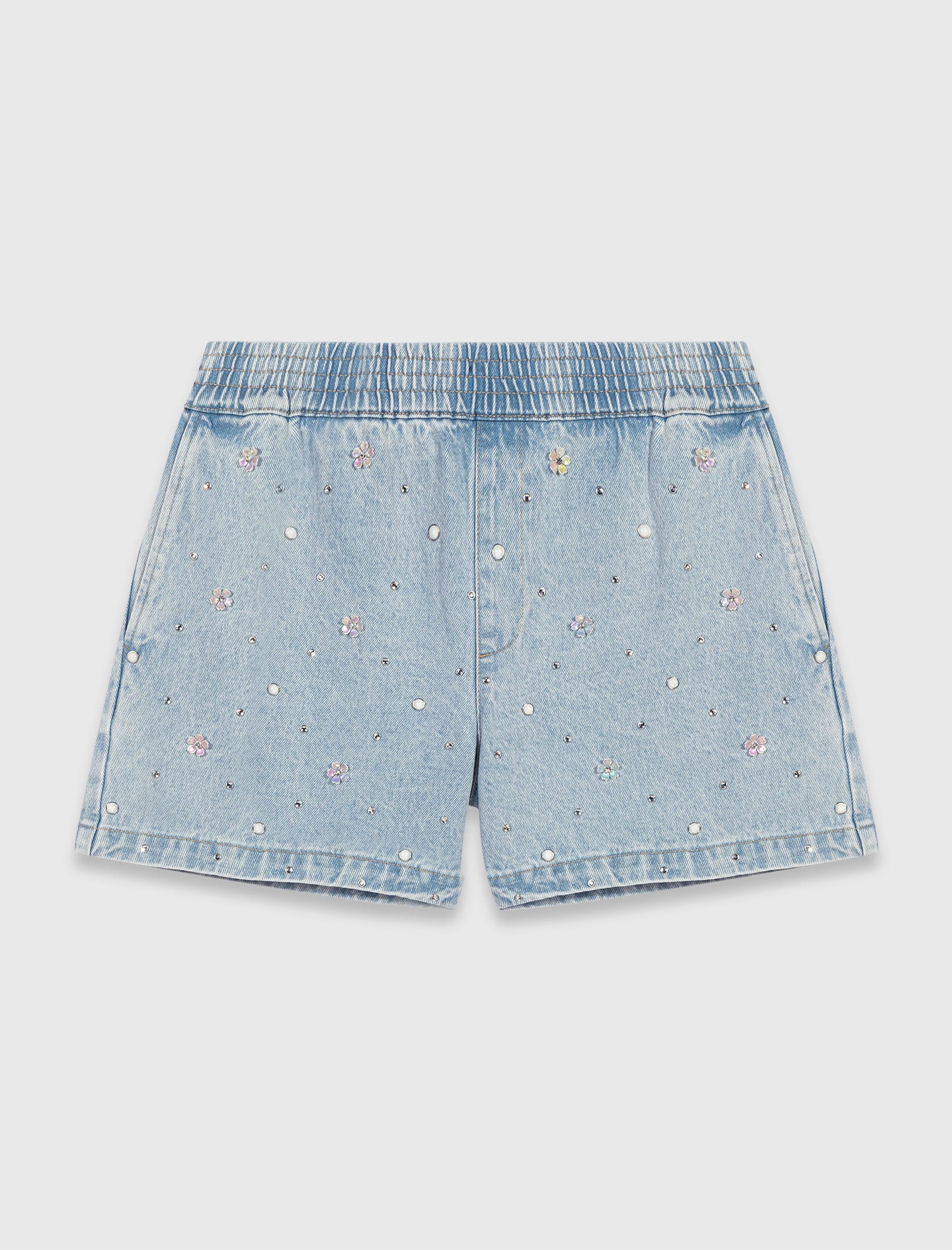 Short vaquero con flores