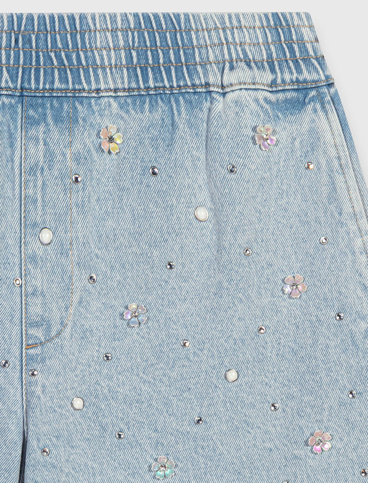 Short vaquero con flores