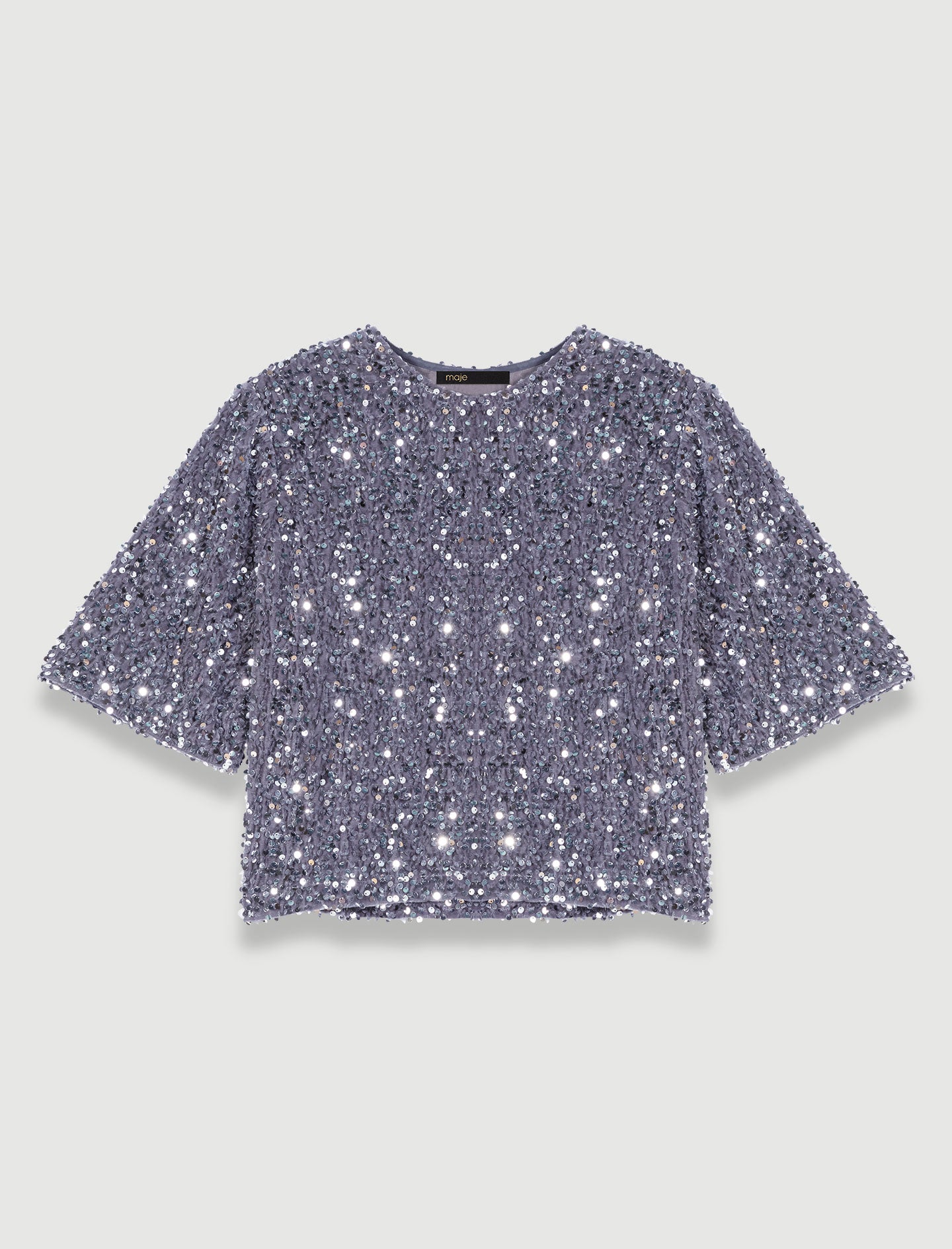 Top de terciopelo y lentejuelas